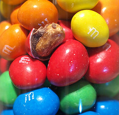 photo of blue, green, red, yellow, and orange m&m's