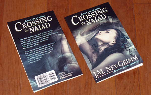 Front and back book covers depicting a naiad underwater