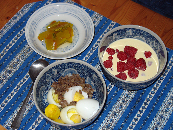 lacto-fermented watermelon pickles, berries and cream, boiled eggs and butter, ground sausage