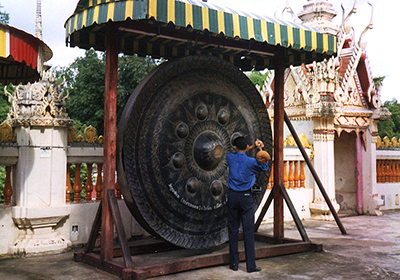 A very large Thai gong at a temple in Roi Et, Isan, Thailand